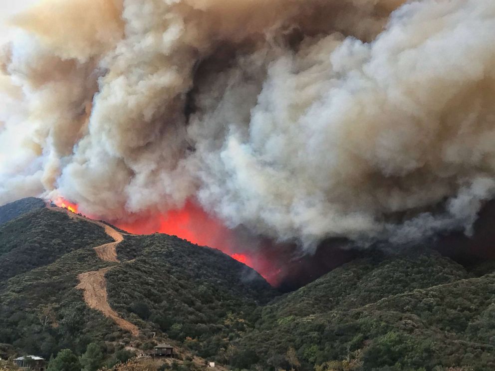 PHOTO: Flames churn towards a large fire break near homes along Gibraltar Road north of Santa Barbara, Calif., Dec. 16, 2017.
