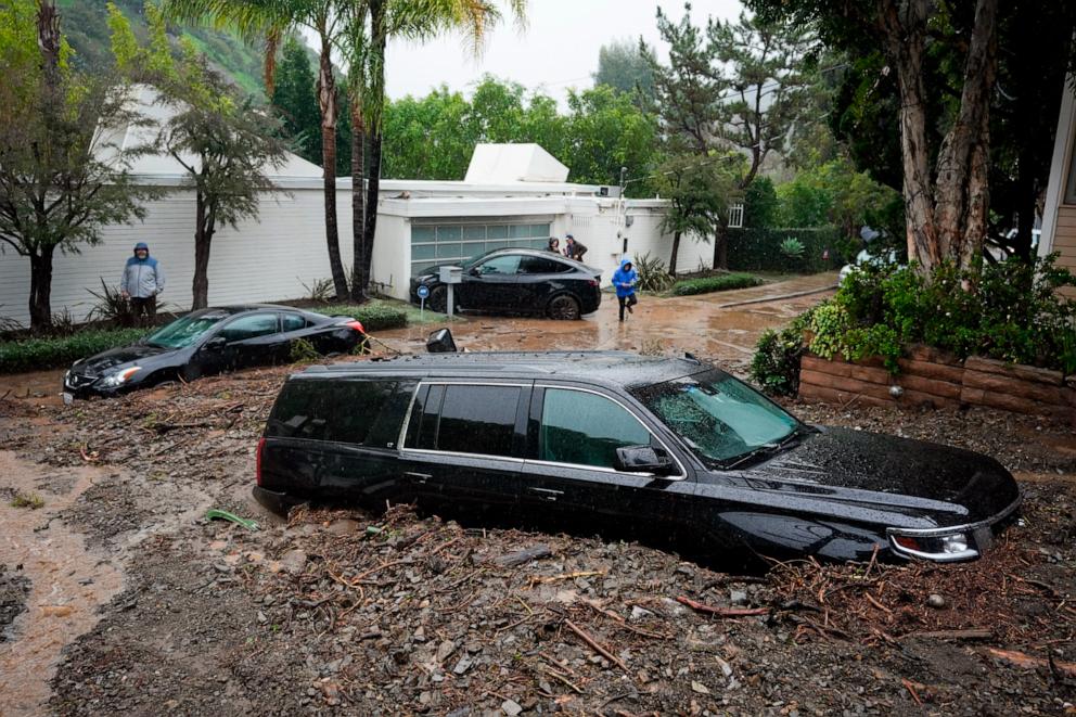 PHOTO: Cars sit buried by a mudslide, Feb. 5, 2024, in the Beverly Crest area of Los Angeles. 
