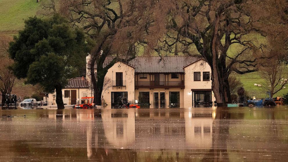 PHOTO: A flooded house is seen partially underwater in Gilroy, Calif, Jan. 09, 2023.