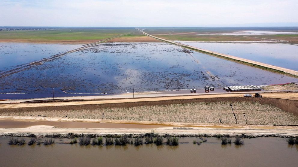 PHOTO: Flooding from Tulare Lake has encompassed streets, homes and farmland.