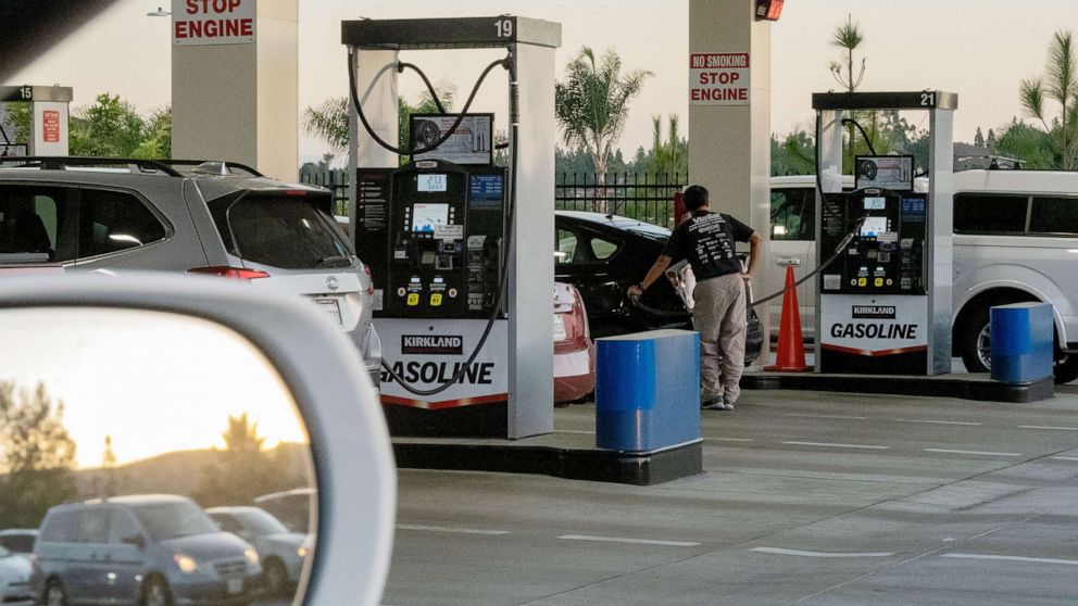 PHOTO: Drivers refuel vehicles at a gas station in San Diego, Oct. 20, 2021.