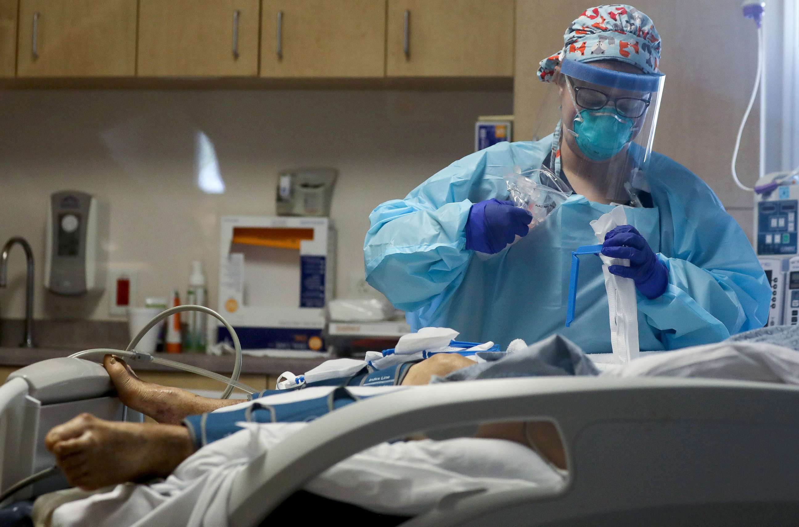 PHOTO: A nurse cares for a COVID-19 patient in the Intensive Care Unit at El Centro Regional Medical Center in hard-hit Imperial County on July 28, 2020, in El Centro, Calif.