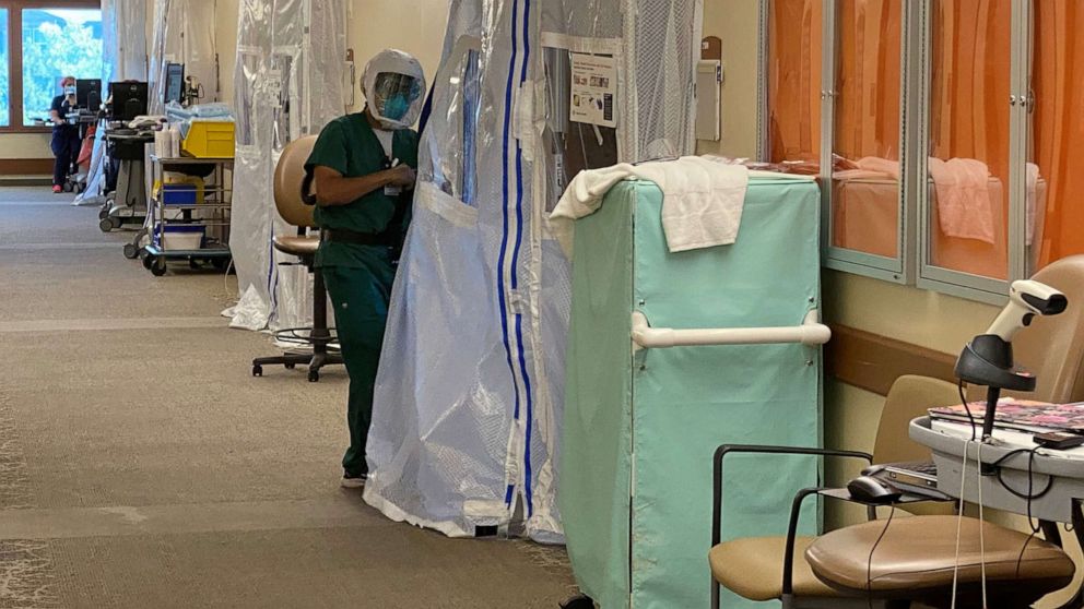 PHOTO: A medical worker wears protective clothing in the Intensive Care Unit (ICU) of St John's Regional Medical Center in Oxnard, Calif., July 9, 2020.