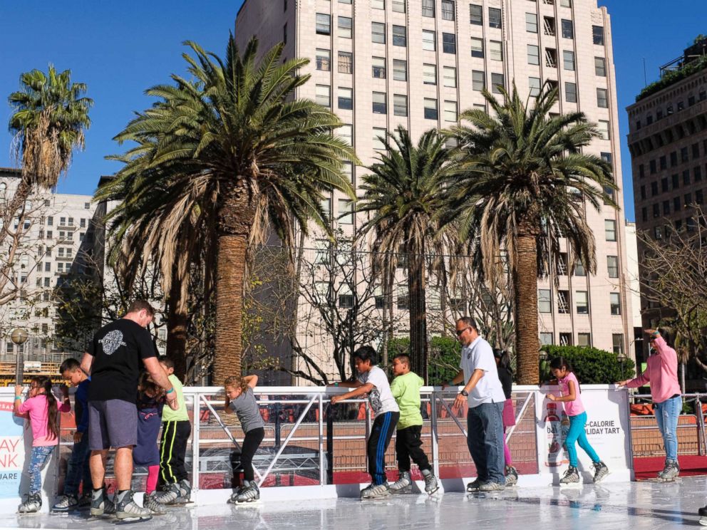 PHOTO: Schoolchildren carefully maneuver their way around the Holiday Ice Rink in Pershing Square in downtown Los Angeles on Nov. 22, 2017.