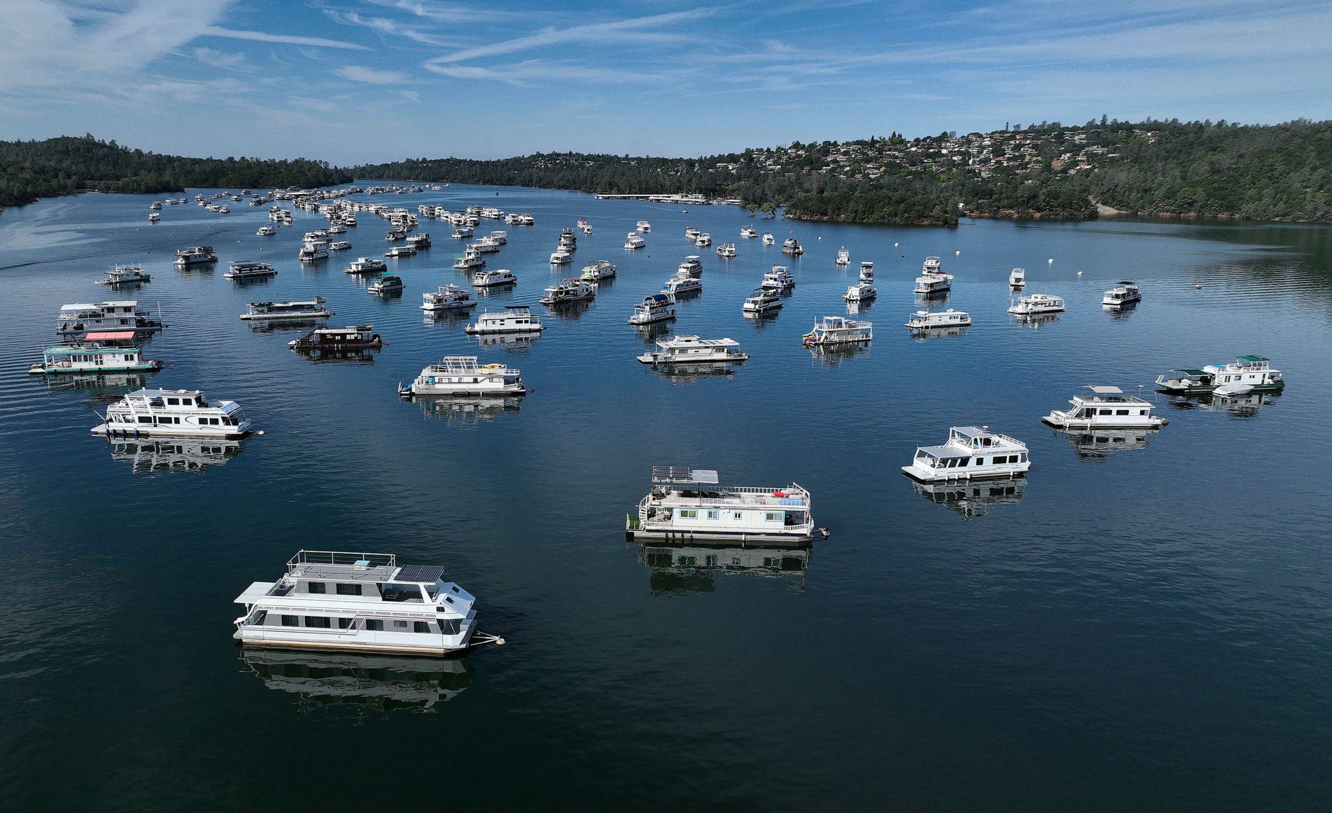 PHOTO: In an aerial view, houseboats sit anchored at Bidwell Canyon Marina on Lake Oroville, June 15, 2023 in Oroville, Calif.