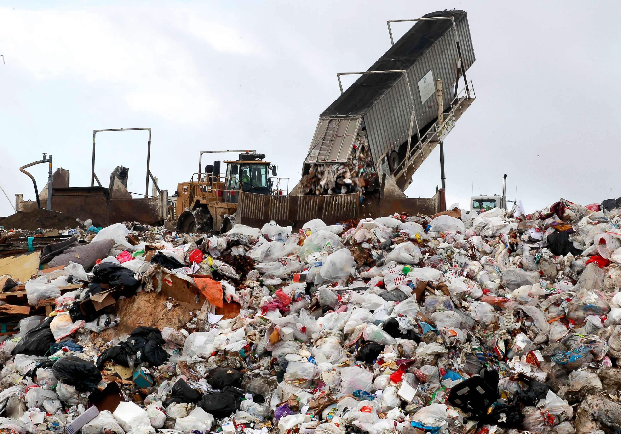 PHOTO: In this Dec. 26, 2012, file photo, a San Francisco Recology truck drops about 20 tons of trash at the Waste Management landfill in Livermore, Calif.