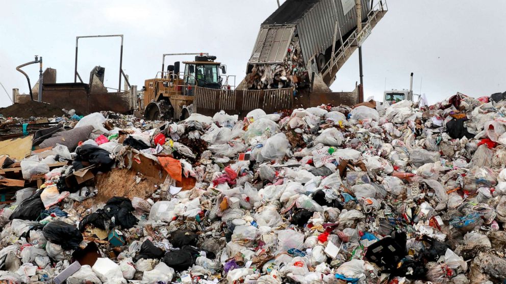 PHOTO: In this Dec. 26, 2012, file photo, a San Francisco Recology truck drops about 20 tons of trash at the Waste Management landfill in Livermore, Calif.