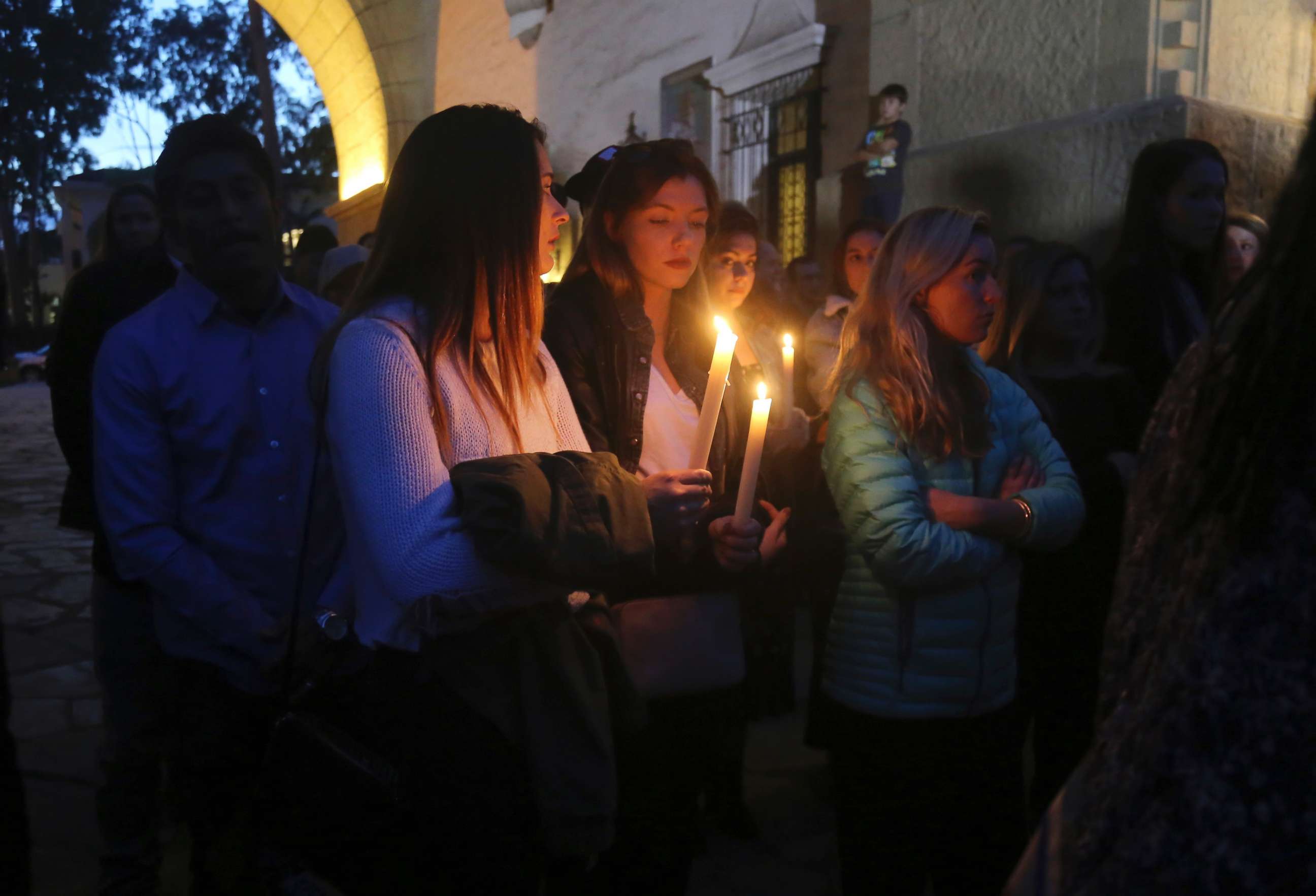PHOTO: People attend a candlelight vigil in Santa Barbara, Calif., Jan. 14, 2018, to pay tribute to the people who were killed when mudslides ravaged a Southern California. 