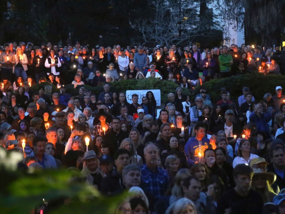 PHOTO: People attend a candlelight vigil in Santa Barbara, Calif., Jan. 14, 2018, to pay tribute to the people who were killed when mudslides ravaged a Southern California.