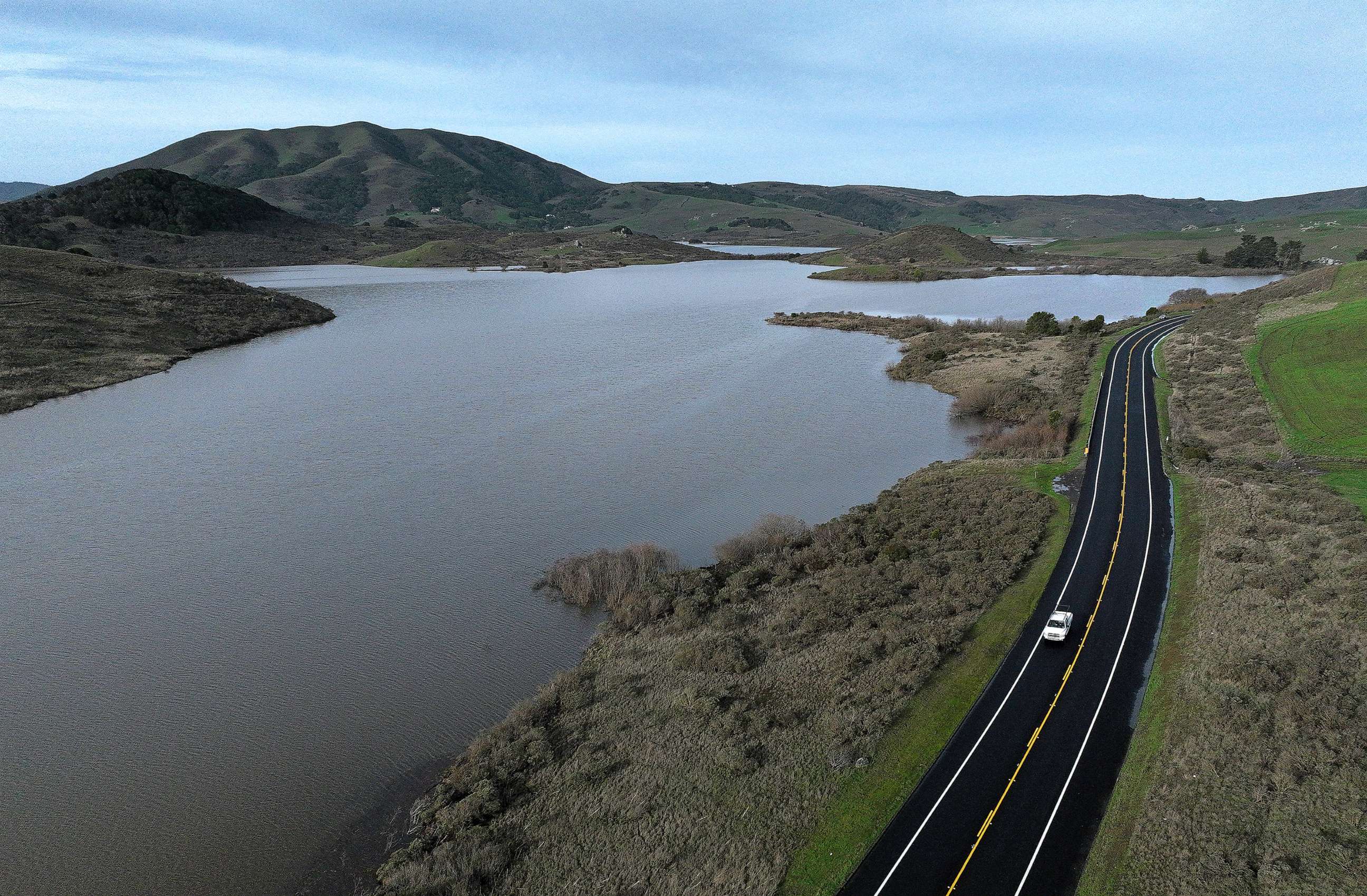 PHOTO: In an aerial view, the Nicasio Reservoir is seen at 100 percent capacity after a series of atmospheric river events drenched Northern California, on Jan. 12, 2023, in Nicasio, Calif.