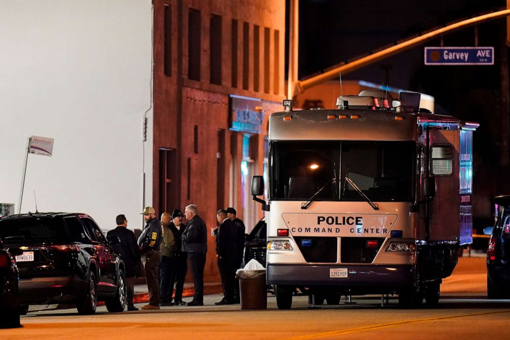 PHOTO: Investigators gather at a scene where a shooting took place in Monterey Park, Calif., Sunday, Jan. 22, 2023.