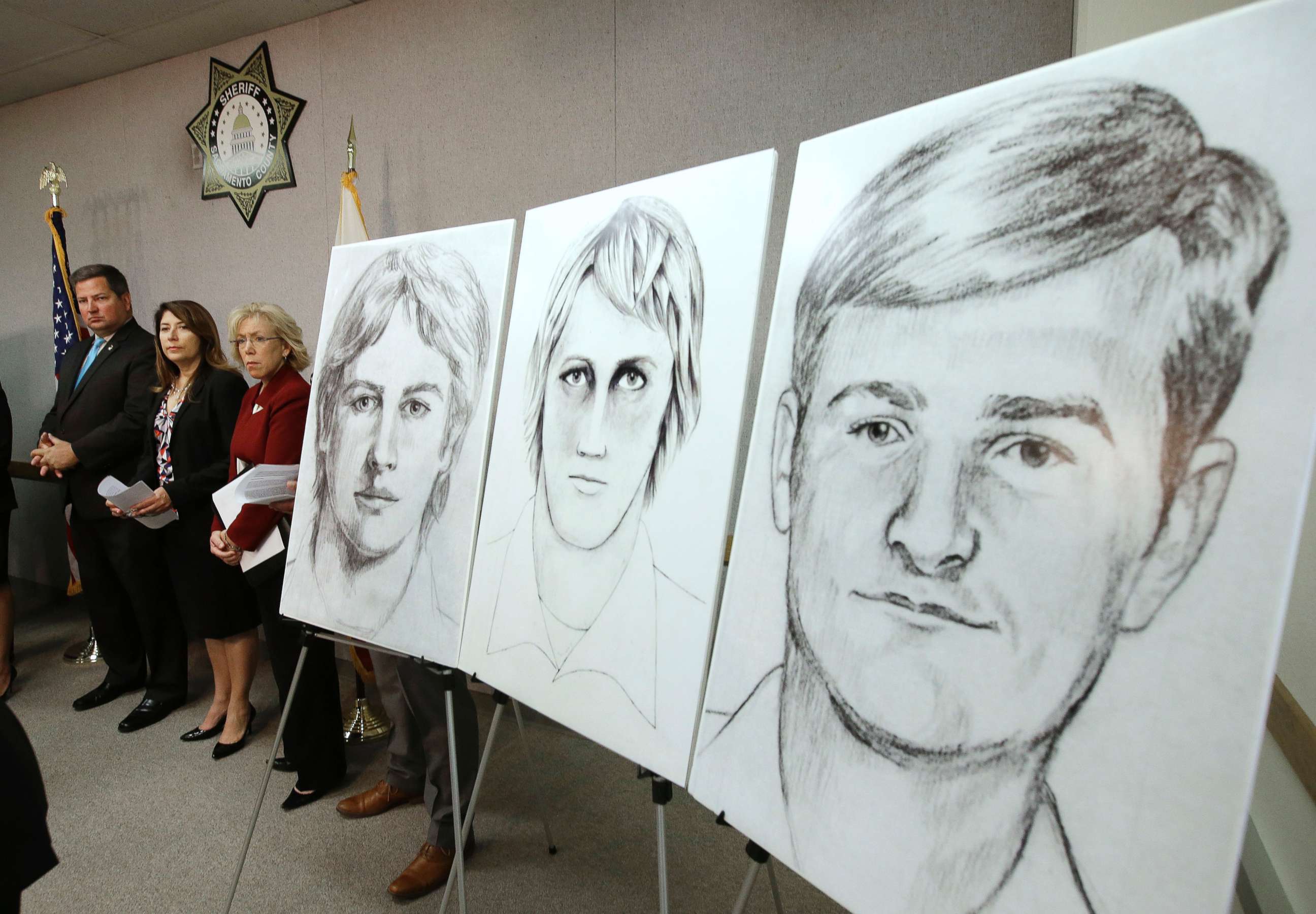 In this June 15, 2016 photo law enforcement drawings of a suspected serial killer believed to have committed at least 12 murders across California in the 1970's and 1980's are displayed at a news conference in Sacramento, Calif.