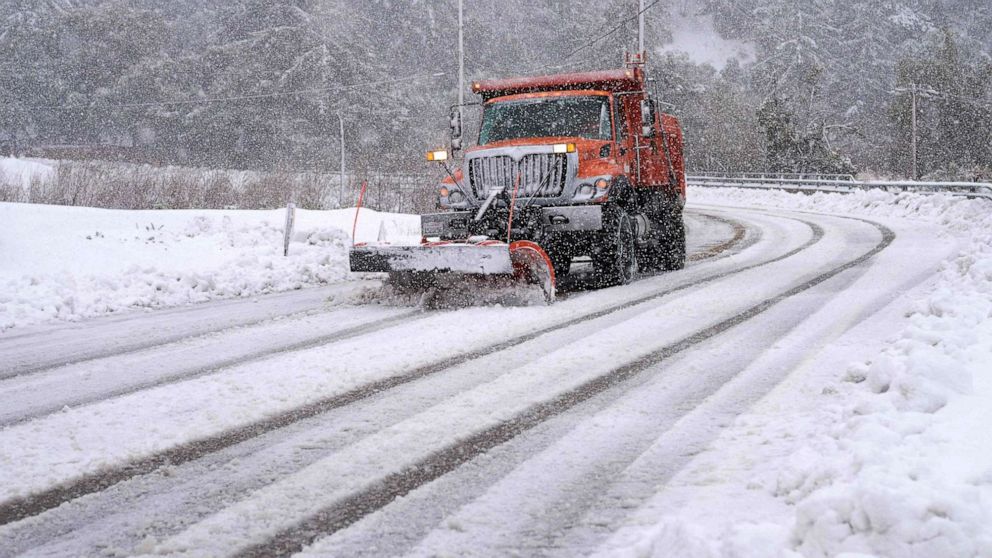 PHOTO: A plow clears snow on Mount Baldy Road in the town of Mount Baldy, Calif., on Feb. 24, 2023.
