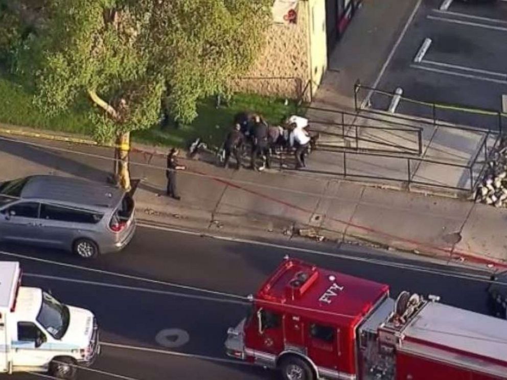 PHOTO: Paramedics attend to a man who was stabbed during a string of robberies in Garden Grove and Santa Ana, Calif., on Wednesday, Aug. 7, 2019.