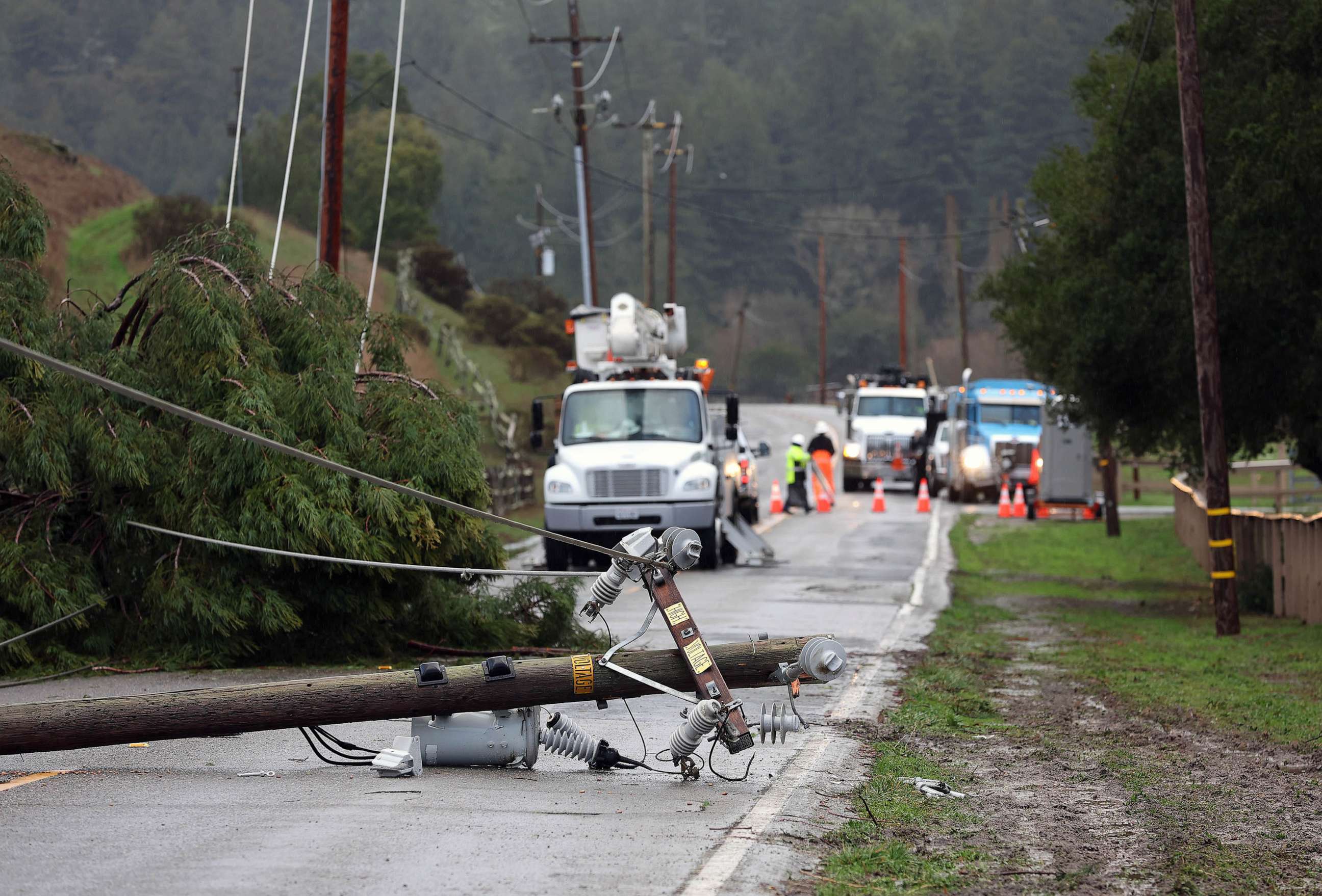 PHOTO: A utility pole rests on Nicasio Valley Road after being toppled by high winds, Jan. 05, 2023 in Nicasio, California.