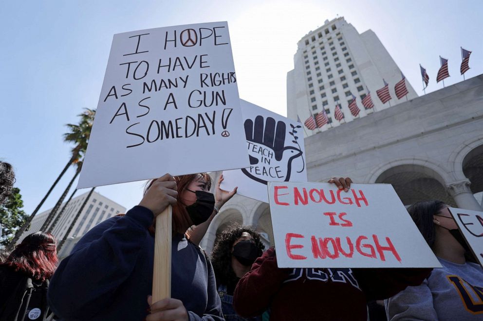 PHOTO: Lindsey Vides, 16, is holding a sign as students from Miguel Contreras Learning Center high school in Los Angeles demonstrate in front of City Hall after walking out of school to protest U.S. gun violence, May 31, 2022.