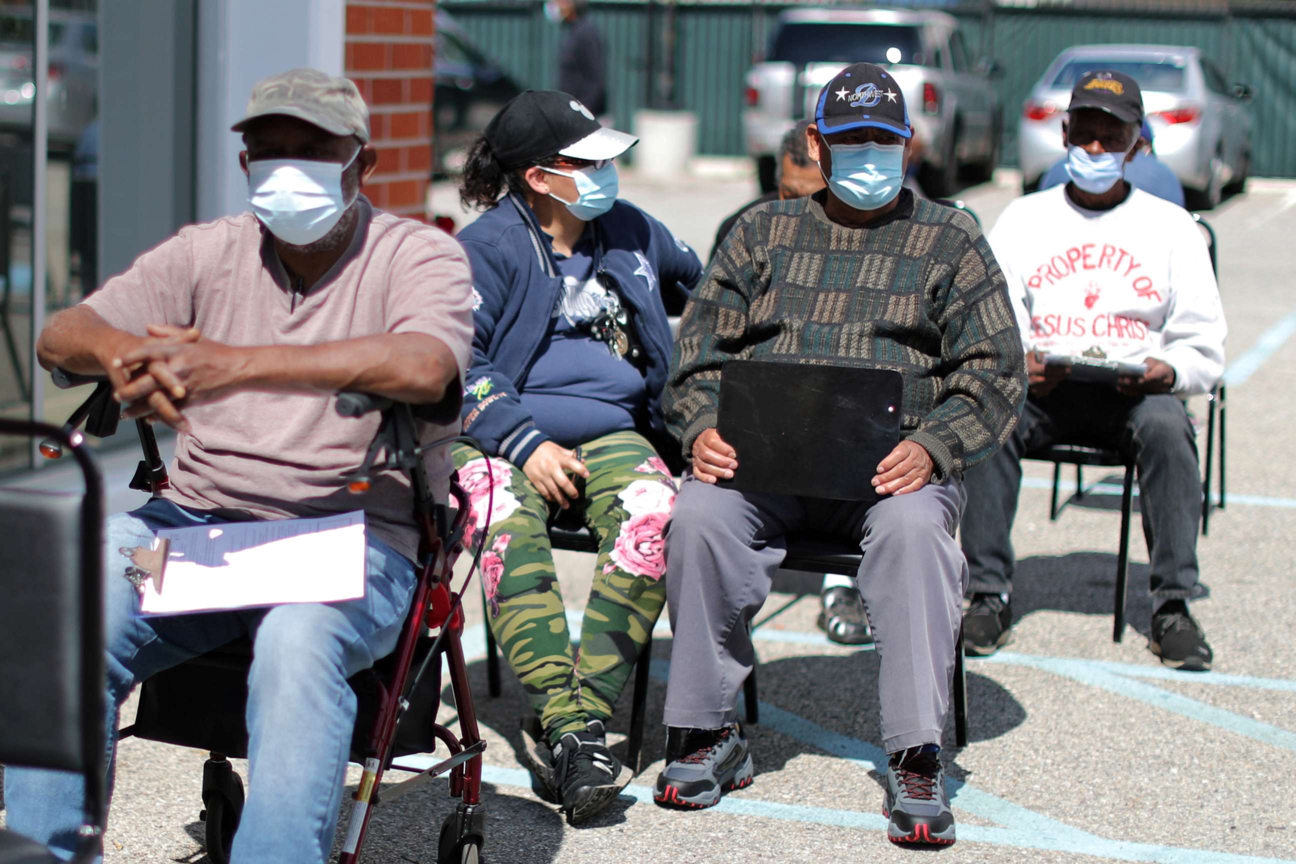 PHOTO: People wait to receive a second coronavirus disease (COVID-19) vaccination in Los Angeles, March 12, 2021.