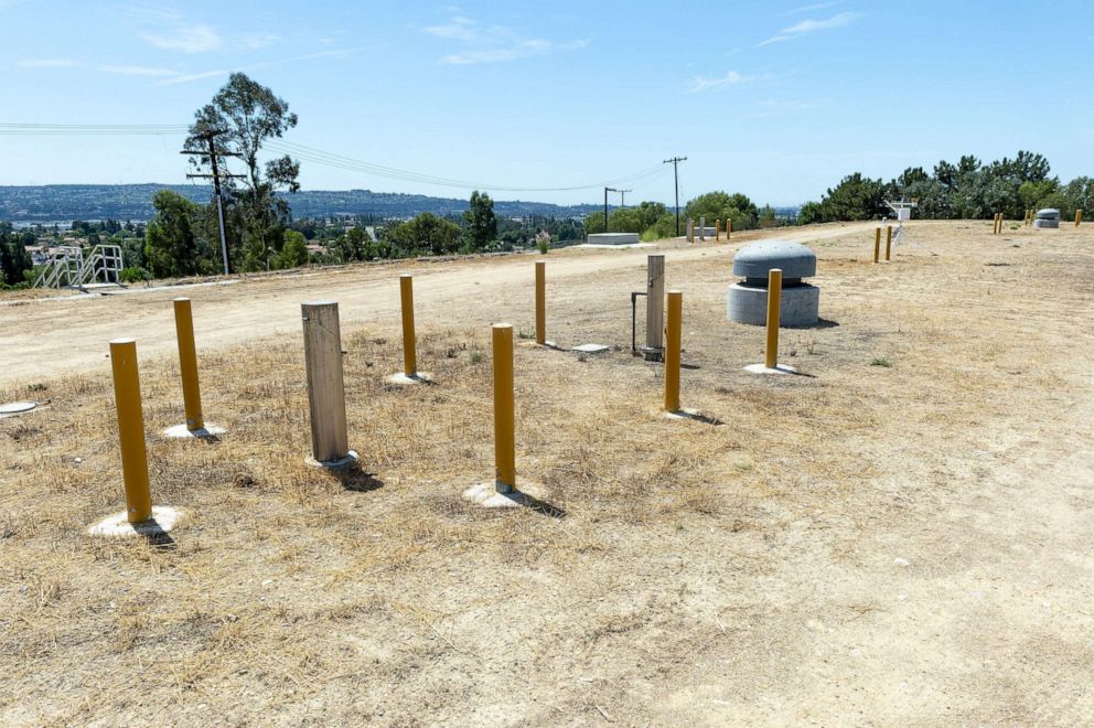 PHOTO: In this August 26, 2019, file photo, water sample ports and air vents are the only structures visible on the top of the covered Highland Reservoir in Yorba Linda, Calif., which holds 6 million gallons of water