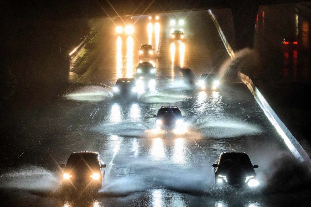 PHOTO: Drivers barrel into standing water on Interstate 101 in San Francisco, Jan. 4, 2023.