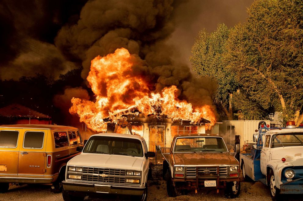 PHOTO: Flames consume a home as the Sugar Fire, part of the Beckwourth Complex Fire, tears through Doyle, Calif., July 10, 2021.