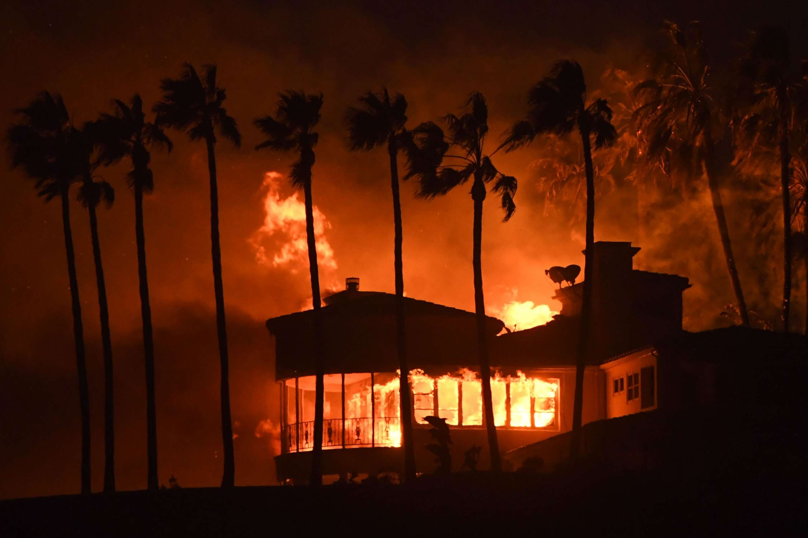 PHOTO: A house burns during the Woolsey Fire on Nov. 9, 2018 in Malibu, Calif.