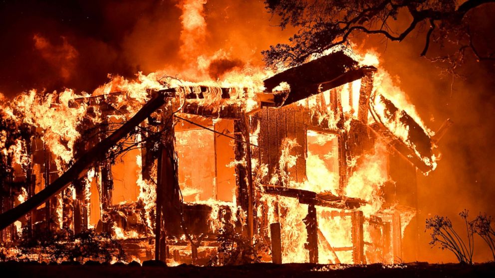 PHOTO: Flames ravage a home in the Napa wine region in California, Oct. 9, 2017, as multiple wind-driven fires continue to whip through the region.