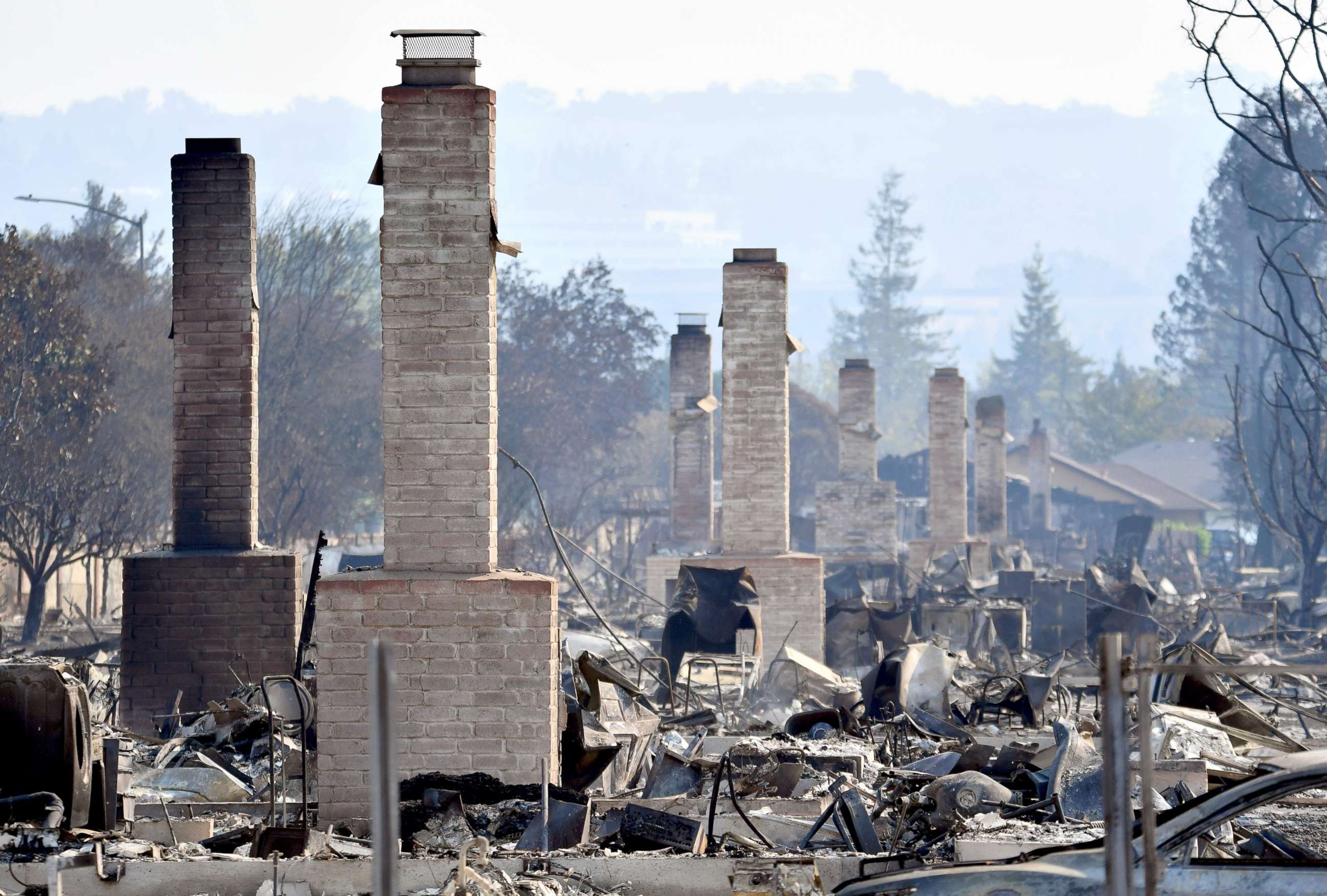 PHOTO: Chimneys are all that remain standing amidst a swath of burned out properties in Santa Rosa, Calif., Oct. 12, 2017.
