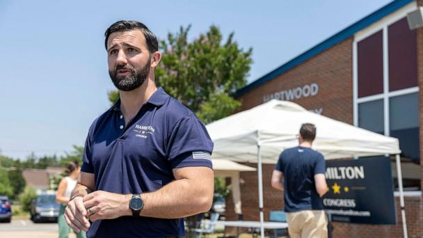 Cameron Hamilton, a republican candidate for Virginia's 7th congressional district, speaks to voters at Hartwood Elementary School in Fredericksburg, Virginia, on June 8, 2024.