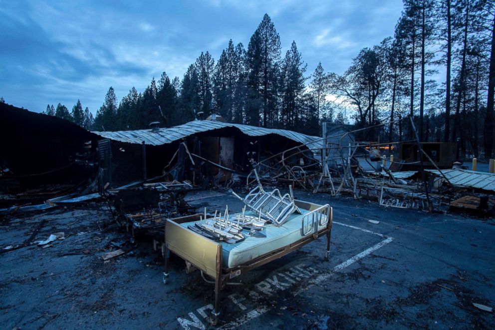 PHOTO: A bed rests outside Cypress Meadows Post-Acute, a nursing home leveled by the Camp Fire, Dec. 4, 2018, in Paradise, Calif. 