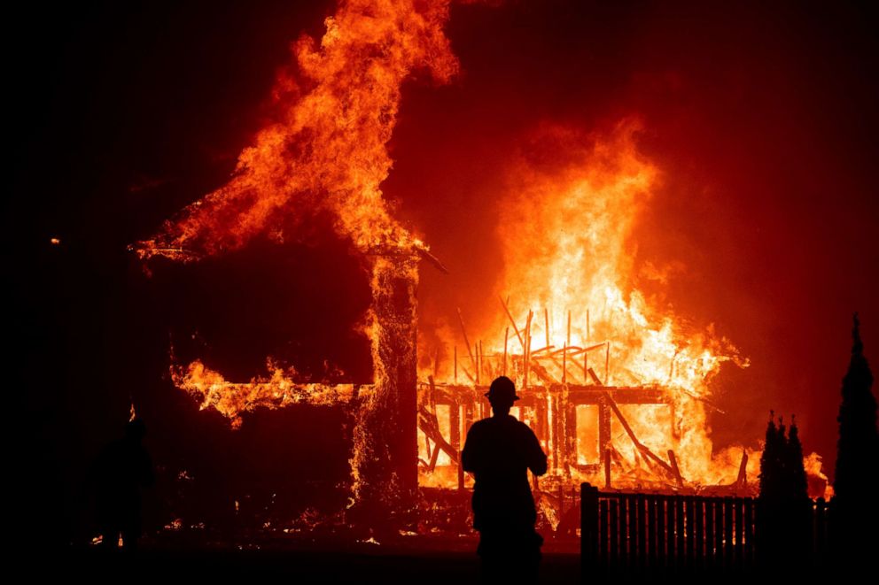 PHOTO: In this file photo taken on Nov. 8, 2018, a home burns during a wildfire in Paradise, California.