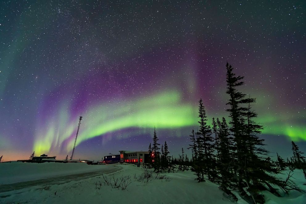 PHOTO: Auroras over the Rocket Range Road and Northern Studies Centre in Churchill, Manitoba, March, 18, 2020.