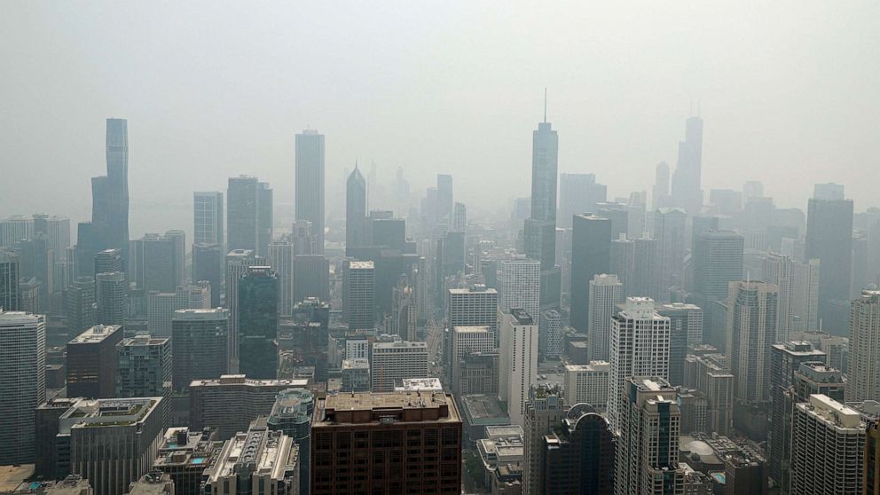 PHOTO: Chicago's skyline is seen from the 360 Chicago Observation Deck of the John Hancock Building with heavy smoke from Canadian wildfires blanketing the city on June 27, 2023.