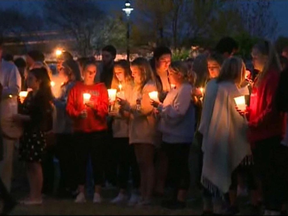 PHOTO: People gather for a candlelight vigil at the University of South Carolina for student Samantha Josephson, whose body was found on March 30, 2019.