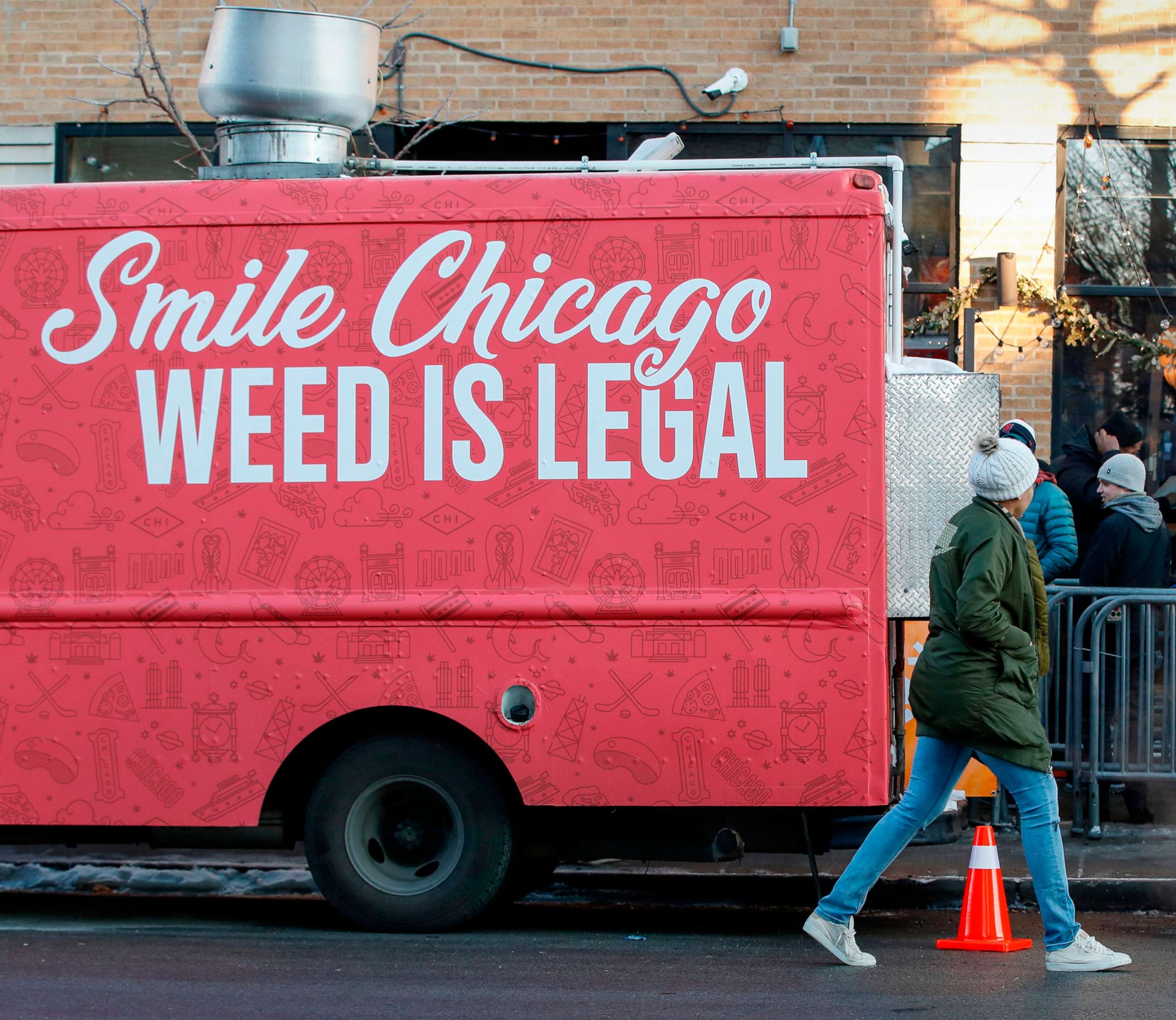 PHOTO: A food truck sits outside the Sunnyside Cannabis Dispensary as customers wait in line to buy marijuana, on Jan. 1, 2020 in Chicago. On the first day of 2020, recreational marijuana  became legal in Illinois.