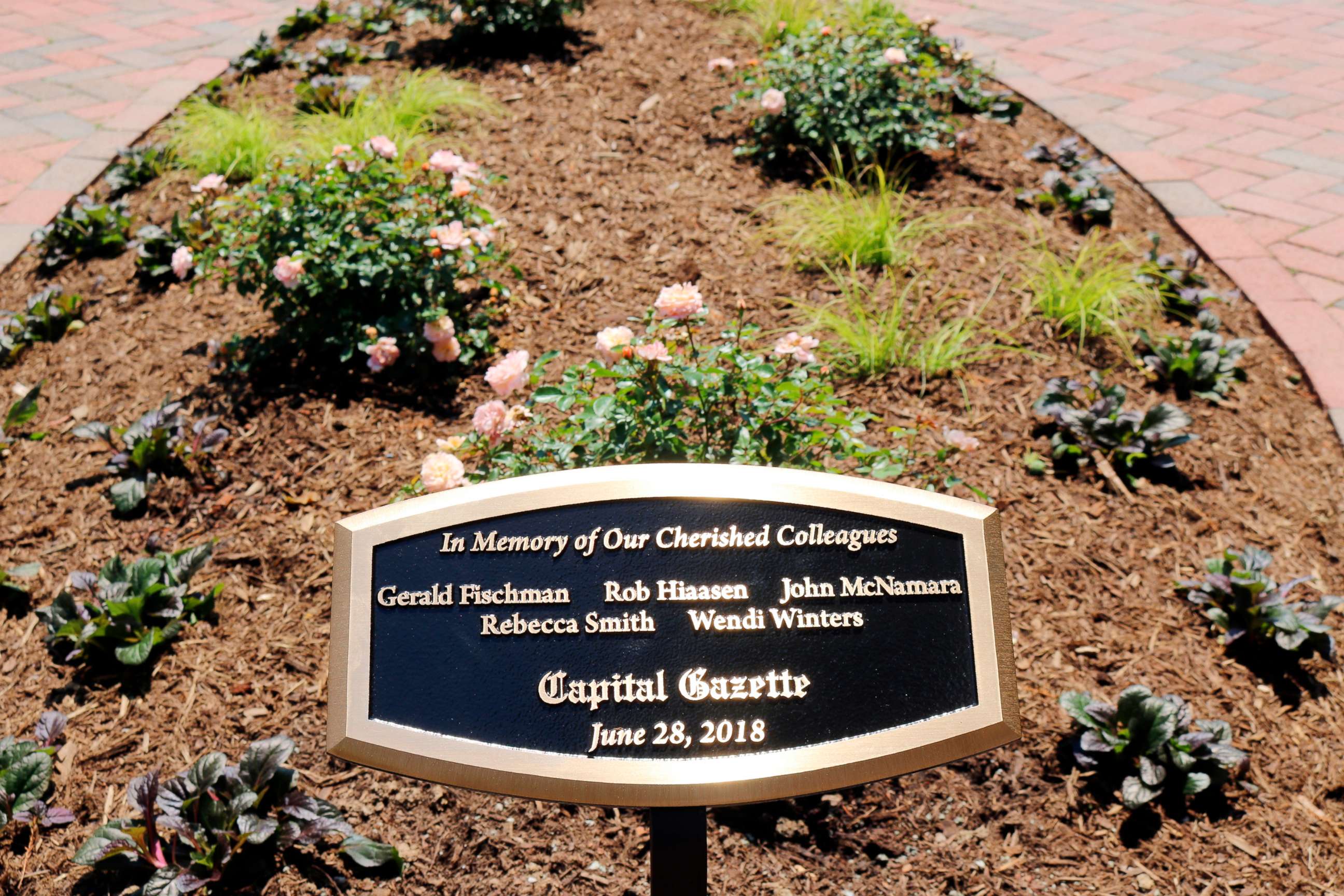 PHOTO: A memorial to the five Capital Gazette employees, who died in a shooting in the newspaper's newsroom last year, was unveiled Friday, June, 28, 2019, at a park in Annapolis, Md.
