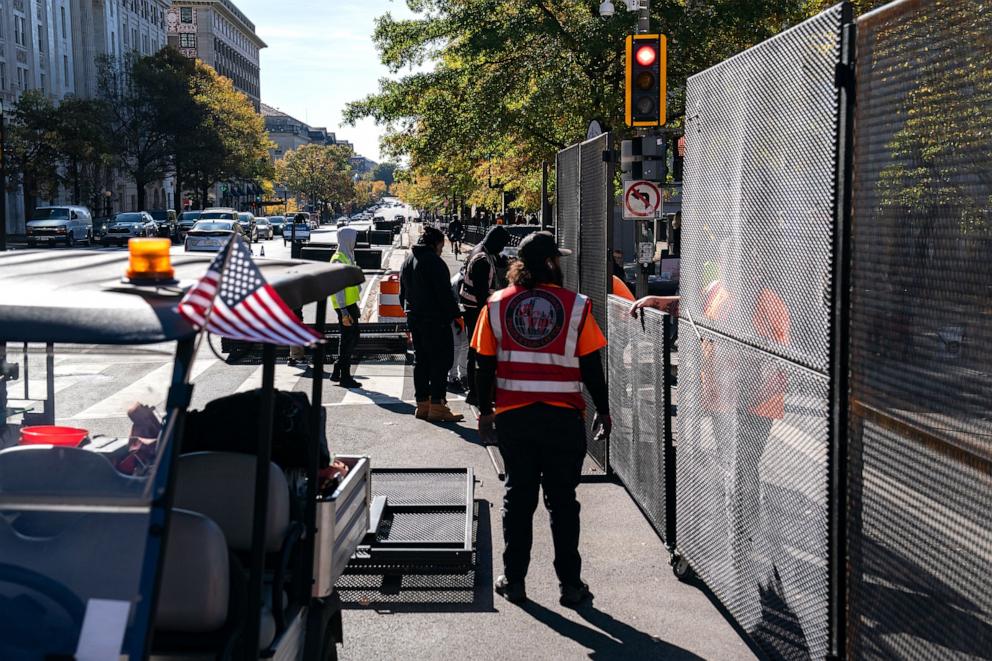 PHOTO: Workers erect anti-scale fencing around the White House and the Treasury Department , Nov. 3, 2024. The Nation's Capitol is bracing for protests and potential unrest with a contentious Election Day looming on the horizon.