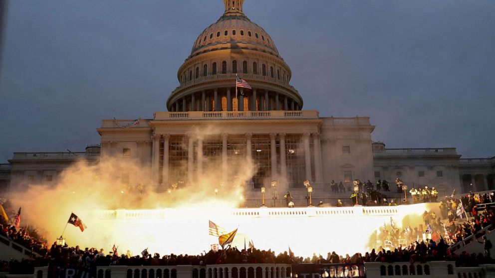 PHOTO: FILE - An explosion caused by a police munition is seen while supporters of U.S. President Donald Trump gather in front of the U.S. Capitol Building in Washington, Jan. 6, 2021.