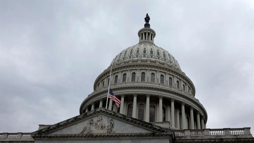 PHOTO: The U.S. flag is flown at half-staff over the Capitol Building in honor of former Senate Majority Leader Harry Reid, Dec. 29, 2021, in Washington, DC.