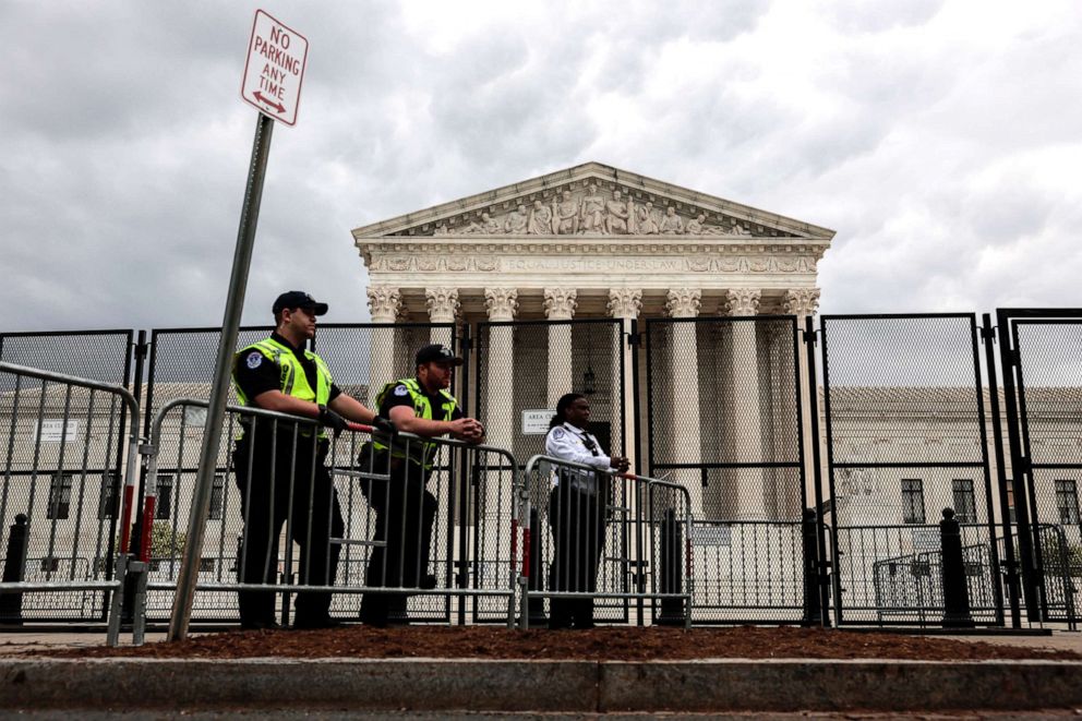 PHOTO: Capitol Police officers observe an abortion rights rally in front of the Supreme Court building, May 5, 2022, in Washington, D.C. 