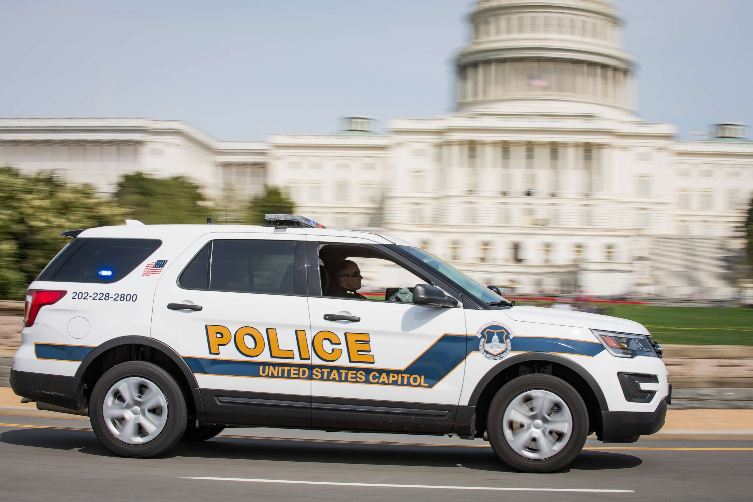 PHOTO: A United States Capitol Police car passes by the Capitol in Washington in this undated image.