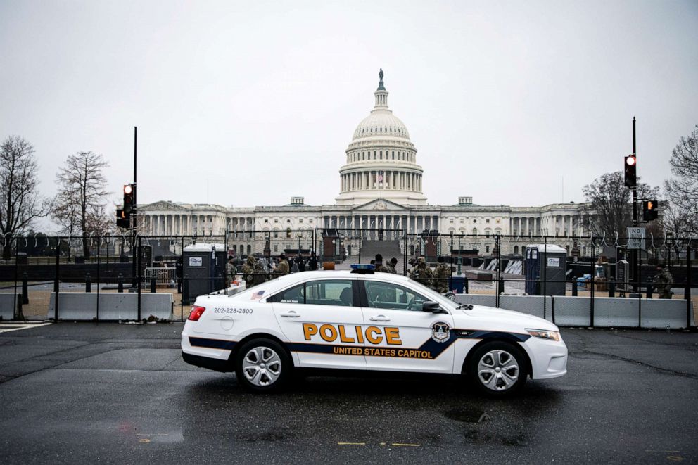 PHOTO: A U.S. Capitol Police car drives past the U.S. Capitol in Washington, D.C., Jan. 26, 2021.