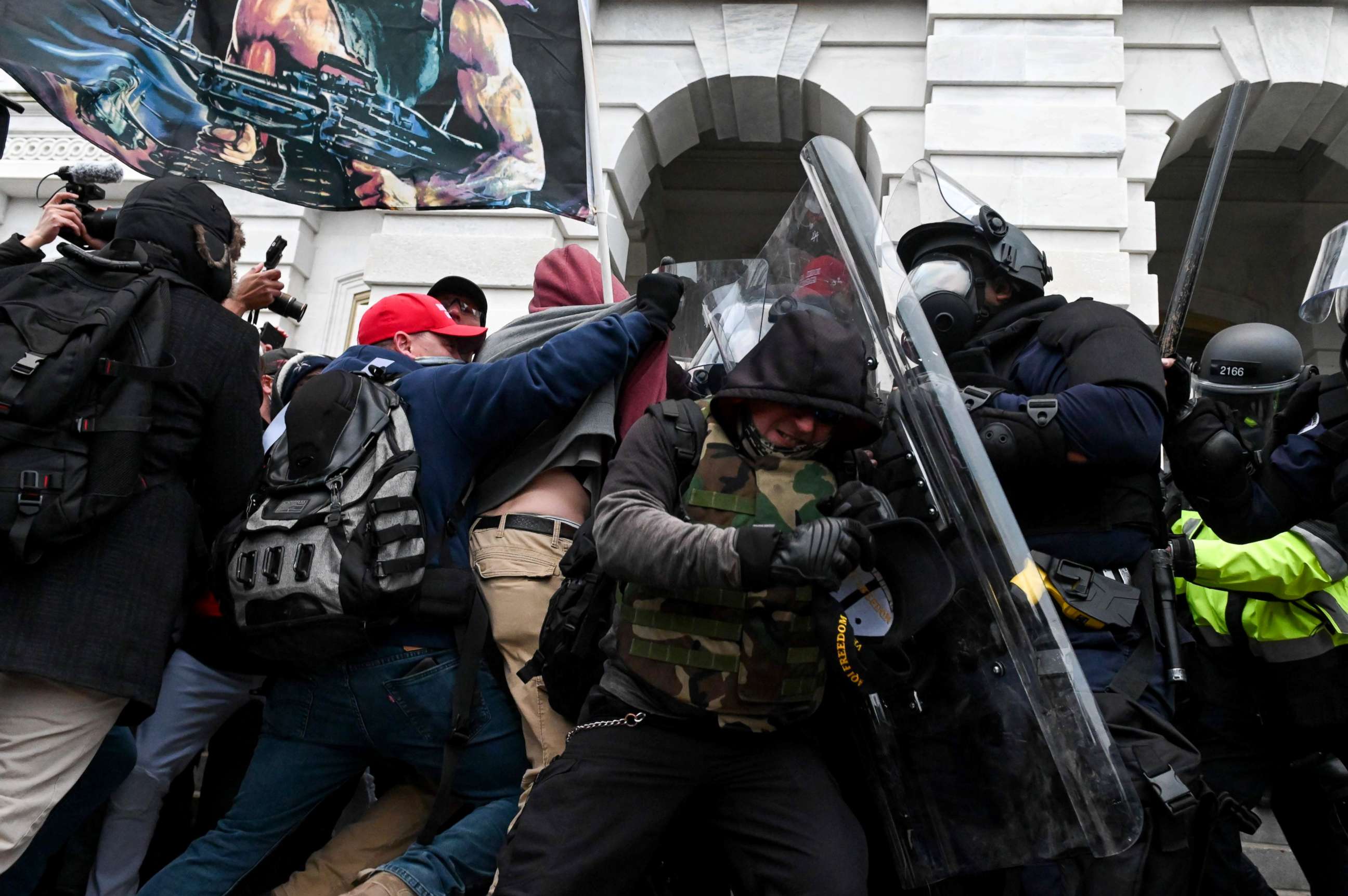PHOTO: Riot police push back a crowd of supporters of US President Donald Trump after they stormed the Capitol building in Washington, D.C., Jan. 6, 2021.