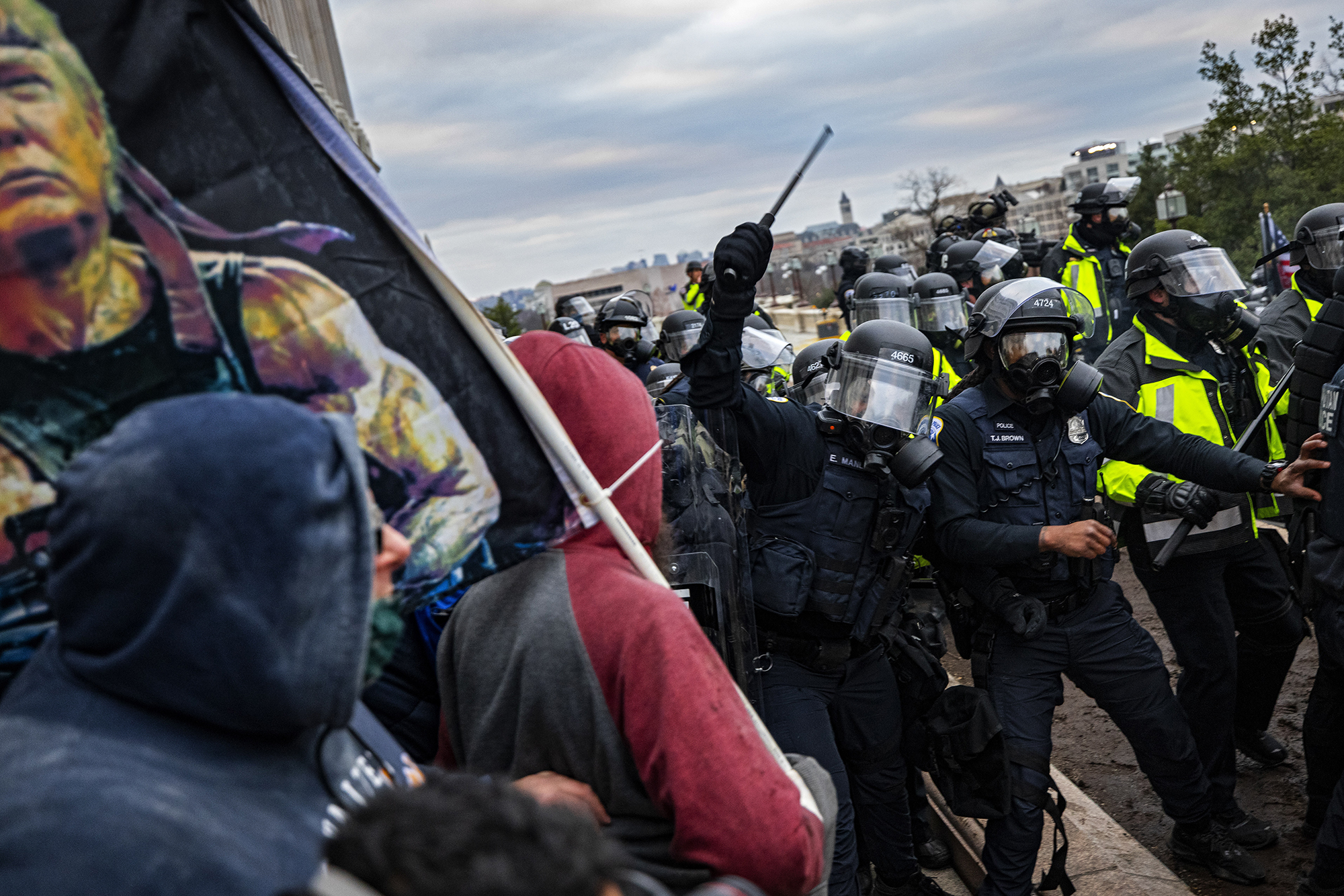 PHOTO:  Police officers attempt to push back a pro-Trump mob trying to storm the U.S. Capitol following a rally with President Donald Trump on Jan. 6, 2021 in Washington, DC.