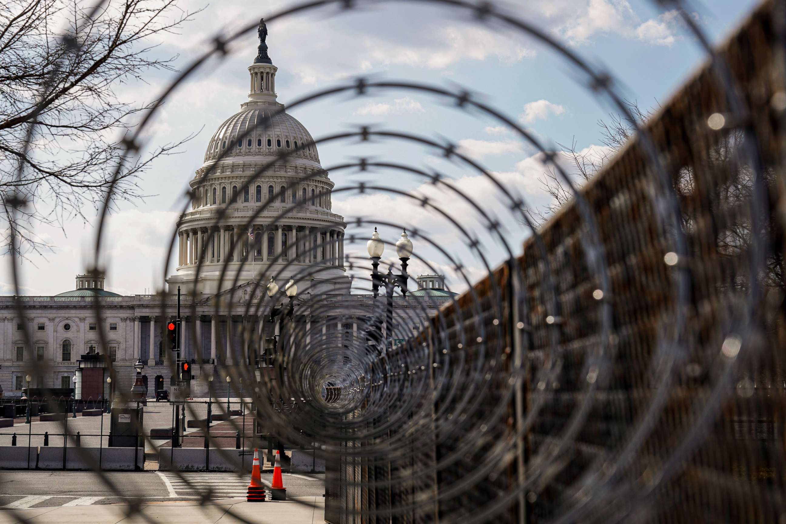 PHOTO: The U.S. Capitol is seen through razor wire after police warned that a militia group might try to attack the U.S. Capitol in Washington, March 4, 2021.