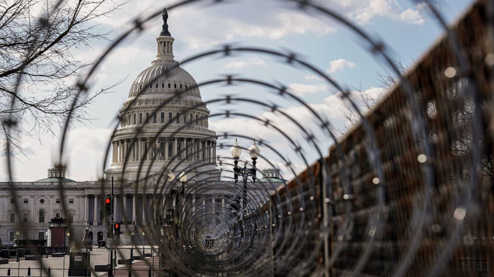 PHOTO: The U.S. Capitol is seen through razor wire after police warned that a militia group might try to attack the U.S. Capitol in Washington, March 4, 2021.
