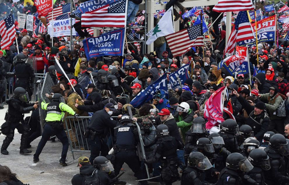 PHOTO: Trump supporters clash with police and security forces as they push barricades to storm the US Capitol in Washington D.C., Jan. 6, 2021.