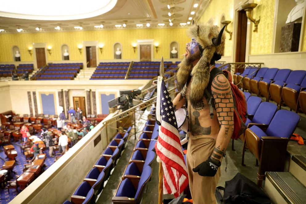PHOTO: A protester yells inside the Senate Chamber on Jan. 06, 2021, in Washington, DC.