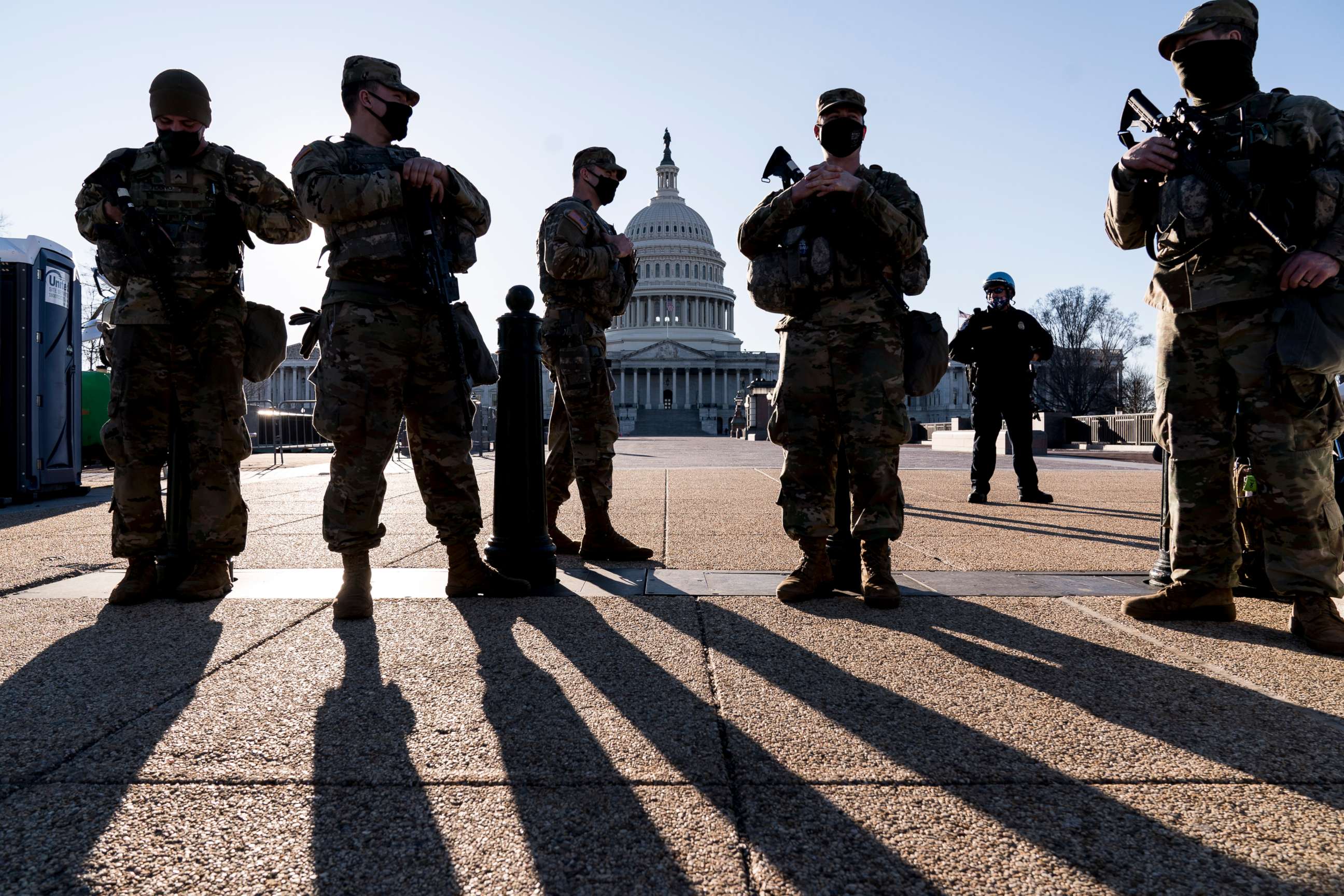 PHOTO: Members of the Michigan National Guard and the U.S. Capitol Police keep watch as heightened security remains in effect around the Capitol grounds in Washington, D.C., Wednesday, March 3, 2021. 