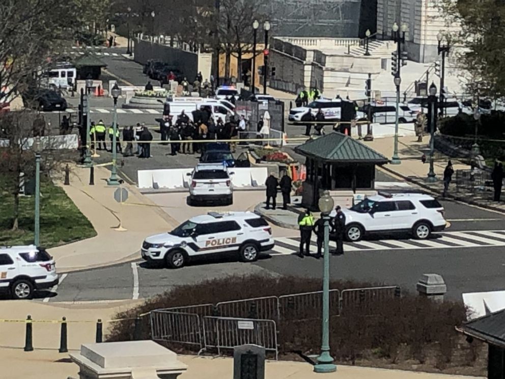 PHOTO: Capitol Police and responders gather near a site where a car crashed into a barrier on Capitol Hill in Washington, April 2, 2021.