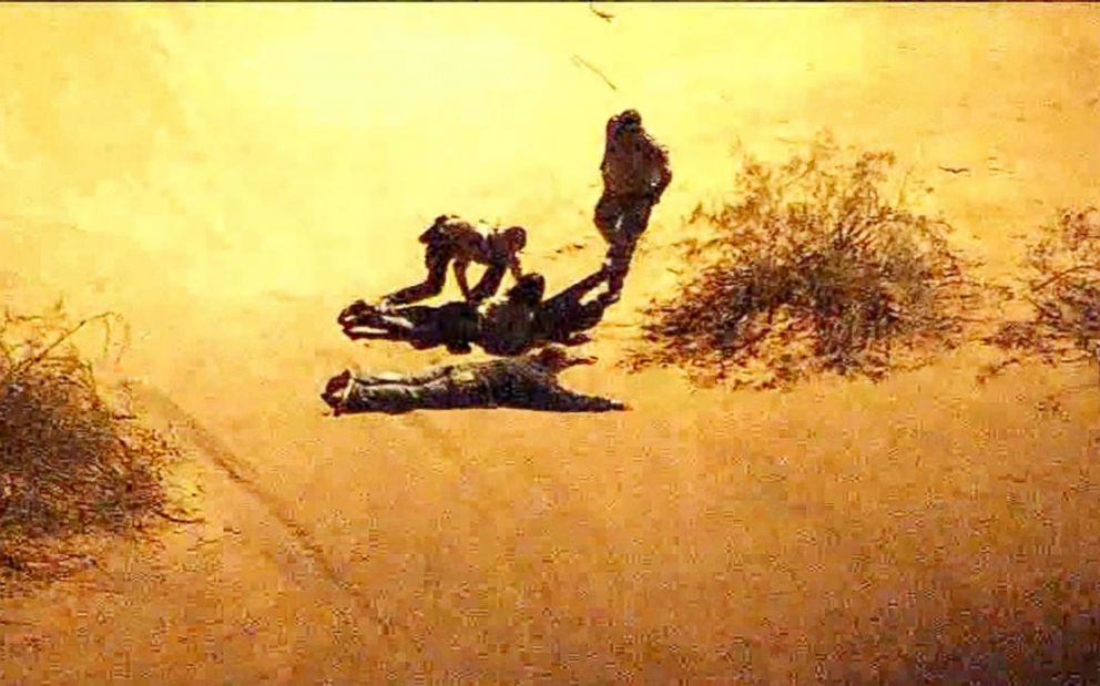 PHOTO: A high-speed car chase in Arizona had a bizarre ending when the suspects embraced shortly after their daring run from authorities ended.